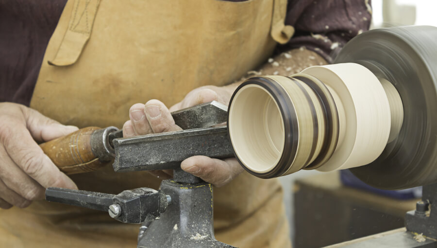 Making a wooden bowl gift using wood lathe.